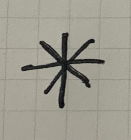 Early logo sketch: a radiating asterisk