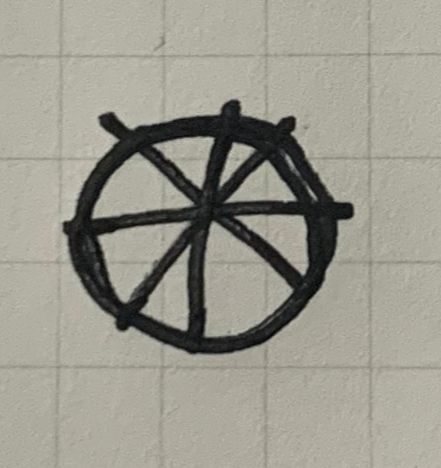Early logo sketch: a spoked wheel